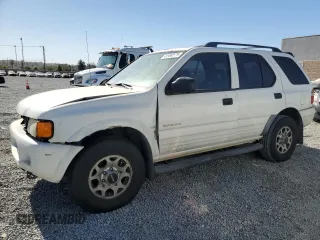 1998 Isuzu Rodeo S z VIN 4S2CK58W2W4367789, wystawiony jako Copart lot #41989575 z przebiegiem 109 514 mil mil oraz Czysty tytuł • Clean title. Historia ofert i sprzedaży dostępna na DreamBid. Obrazek 1.