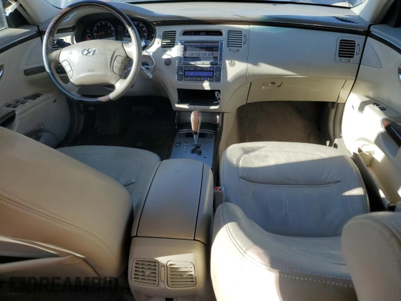 2009 Hyundai Azera Limited z VIN KMHFC46F69A344892, wystawiony jako Copart lot #79239454 z przebiegiem 205 624 mil mil oraz Szkoda całkowita • Salvage title. Historia ofert i sprzedaży dostępna na DreamBid. Obrazek 8.