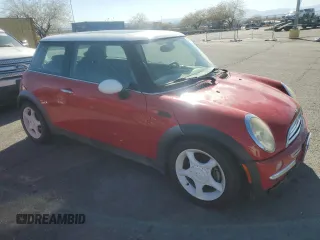 2002 MINI Hardtop with VIN WMWRC33492TC36548, listed as a Copart auction lot 46743455 with 144,260 mi miles and Clean Title. Bid and sale history available at DreamBid. Image 4.