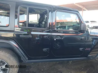 2019 Jeep Wrangler Unlimited Rubicon with VIN 1C4HJXFN5KW522991, listed as a IAAI auction lot 42609616 with 111,844 mi miles and . Bid and sale history available at DreamBid. Image 14.