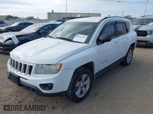 2012 Jeep Compass Latitude with VIN 1C4NJDEB9CD612599, listed as a IAAI auction lot 41582214 with 138,312 mi miles. Bid and sale history available at carsss.com. Image 2.