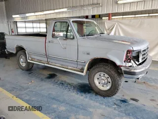 1992 Ford F-250 with VIN 1FTHF26HXNNA56967, listed as a Copart auction lot 83226474 with 150,659 mi miles and Salvage Title. Bid and sale history available at carsss.com. Image 4.