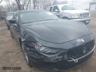 2014 Maserati Ghibli S Q4 with VIN ZAM57RTA9E1091955, listed as a IAAI auction lot 41579468 with 111,185 mi miles. Bid and sale history available at carsss.com. Image 1.