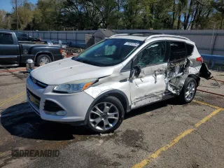 2015 Ford Escape Titanium with VIN 1FMCU0JX8FUB35818, listed as a Copart auction lot 50046785 with 117,761 mi miles and Salvage Title. Bid and sale history available at carsss.com. Image 1.
