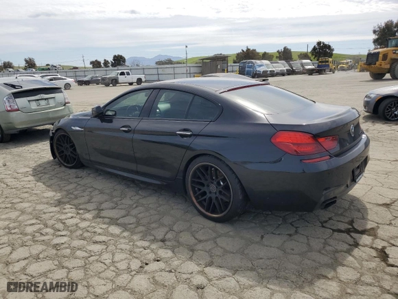 2015 BMW 6 Series 650i with VIN WBA6B2C59FGB99220, listed as a Copart auction lot 50026075 with 100,367 mi miles and Salvage Title. Bid and sale history available at carsss.com. Image 2.