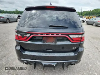 2014 Dodge Durango R/T z VIN 1C4SDJCT4EC318556, wystawiony jako Copart lot #60149025 z przebiegiem 184 114 mil mil oraz Szkoda całkowita • Salvage title. Historia ofert i sprzedaży dostępna na DreamBid. Obrazek 6.