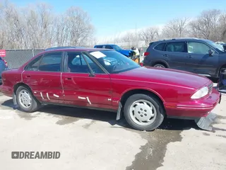 1995 Oldsmobile 88 z VIN 1G3HY52K1SH331973, wystawiony jako IAAI lot #41795311 z przebiegiem 110 407 mil mil oraz . Historia ofert i sprzedaży dostępna na DreamBid. Obrazek 14.
