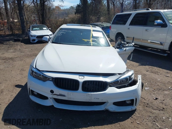 2019 BMW 4 Series 440i xDrive with VIN WBA4J7C58KBM76130, listed as a IAAI auction lot 41885173 with 43,690 mi miles and . Bid and sale history available at carsss.com. Image 11.