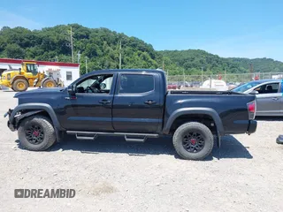 2019 Toyota Tacoma SR with VIN 5TFCZ5AN4KX208354, listed as a IAAI auction lot 42771410 with 77,509 mi miles and . Bid and sale history available at DreamBid. Image 15.