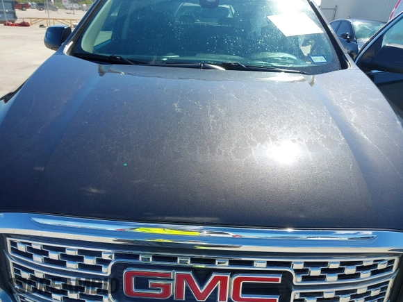 2017 GMC Acadia Denali with VIN 1GKKNPLS0HZ180284, listed as a IAAI auction lot 42220956 with 72,497 mi miles and . Bid and sale history available at DreamBid. Image 6.