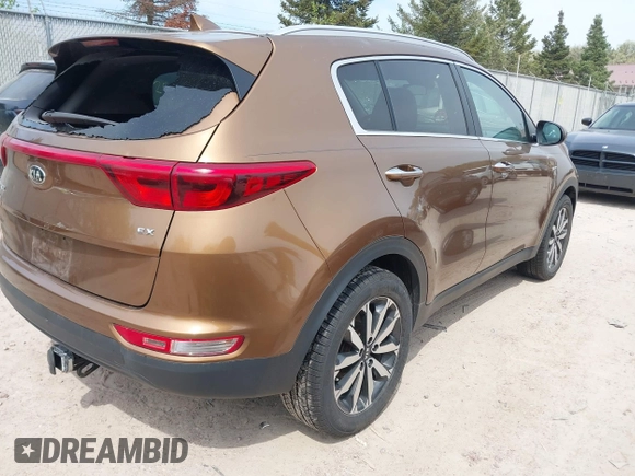 2017 Kia Sportage EX z VIN KNDPNCAC3H7113373, wystawiony jako IAAI lot #42221002 z przebiegiem 112 931 mil mil oraz . Historia ofert i sprzedaży dostępna na DreamBid. Obrazek 4.