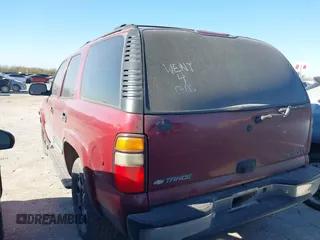 2004 Chevrolet Tahoe LT z VIN 1GNEC13ZX4R166600, wystawiony jako IAAI lot #41728301 z przebiegiem 245 044 mil mil oraz . Historia ofert i sprzedaży dostępna na DreamBid. Obrazek 3.
