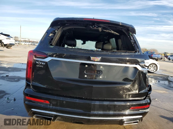 2023 Cadillac XT6 FWD Premium Luxury z VIN 1GYKPCRS6PZ127331, wystawiony jako Copart lot #88802755 z przebiegiem 47 796 mil mil oraz Szkoda całkowita • Salvage title. Historia ofert i sprzedaży dostępna na DreamBid. Obrazek 6.