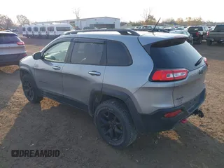 2015 Jeep Cherokee Trailhawk z VIN 1C4PJMBS2FW728961, wystawiony jako IAAI lot #40712830 z przebiegiem 79 299 mil mil oraz . Historia ofert i sprzedaży dostępna na DreamBid. Obrazek 3.