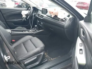 2016 Mazda Mazda6 i Touring with VIN JM1GJ1V56G1462637, listed as a IAAI auction lot 41603296 with 143,931 mi miles. Bid and sale history available at carsss.com. Image 5.