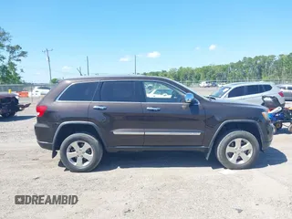2011 Jeep Grand Cherokee Overland with VIN 1J4RR6GT1BC647292, listed as a IAAI auction lot 42069742 with 199,340 mi miles and . Bid and sale history available at DreamBid. Image 13.