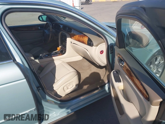 2004 Jaguar XJ 8 with VIN SAJEA71CX4SG10751, listed as a IAAI auction lot 42149348 with 89,786 mi miles and . Bid and sale history available at DreamBid. Image 5.