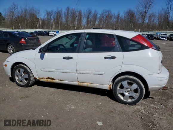 2004 Ford Focus with VIN 3FAFP37Z74R121213, listed as a Copart auction lot 53339645 with 65,590 mi miles and Clean title. Bid and sale history available at DreamBid. Image 2.