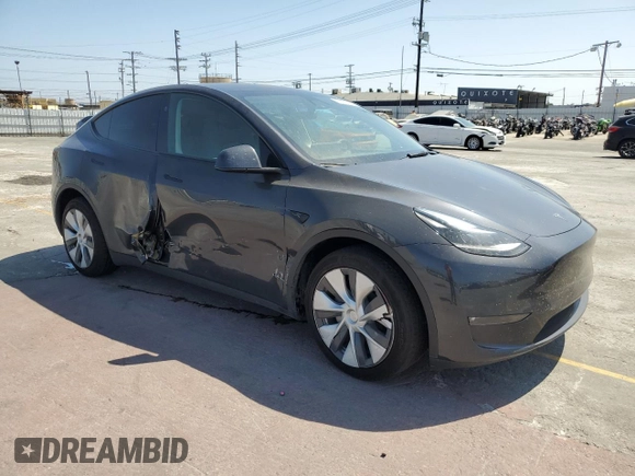 2024 Tesla Model Y Long Range z VIN 7SAYGDEE0RF062395, wystawiony jako Copart lot #55071185 z przebiegiem 42 747 mil mil oraz Szkoda całkowita • Salvage title. Historia ofert i sprzedaży dostępna na DreamBid. Obrazek 4.