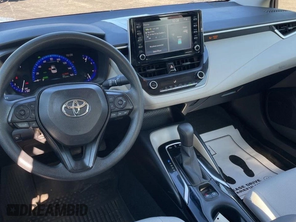 2021 Toyota Corolla Hybrid LE with VIN JTDEAMDE0MJ009233, listed as a Copart auction lot 47366915 with 212,244 mi miles and Clean Title. Bid and sale history available at carsss.com. Image 9.