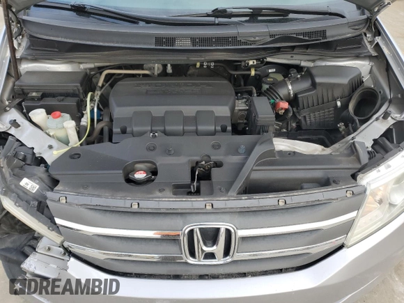 2012 Honda Odyssey EX-L with VIN 5FNRL5H60CB117376, listed as a Copart auction lot 50740725 with 163,716 mi miles and Salvage Title. Bid and sale history available at DreamBid. Image 14.