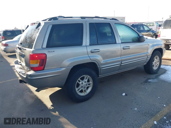 2001 Jeep Grand Cherokee Limited with VIN 1J4GW58N91C688438, listed as a IAAI auction lot 41830334 with 184,420 mi miles. Bid and sale history available at carsss.com. Image 4.