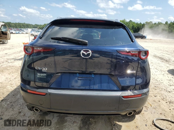 2024 Mazda CX-30 S Carbon Edition with VIN 3MVDMBCM2RM678452, listed as a Copart auction lot 61675535 with 9,573 mi miles and Salvage title. Bid and sale history available at DreamBid. Image 6.