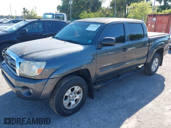 2009 Toyota Tacoma PreRunner with VIN 3TMJU62N59M088137, listed as a IAAI auction lot 41775410 with 217,331 mi miles. Bid and sale history available at carsss.com. Image 18.