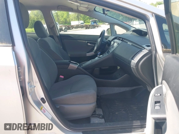 2012 Toyota Prius One z VIN JTDKN3DU1C5489783, wystawiony jako IAAI lot #42376357 z przebiegiem 246 966 mil mil oraz . Historia ofert i sprzedaży dostępna na DreamBid. Obrazek 5.