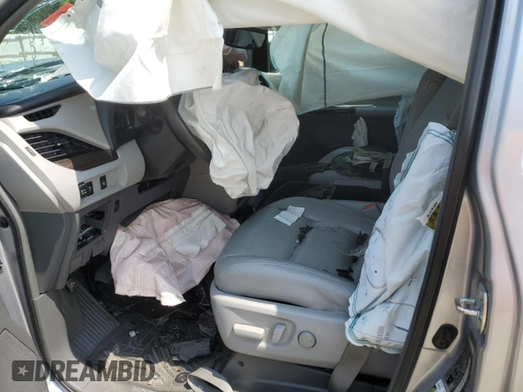 2015 Toyota Sienna XLE with VIN 5TDYK3DC9FS559460, listed as a Copart auction lot 59599405 with Not provided miles and Salvage title. Bid and sale history available at DreamBid. Image 7.