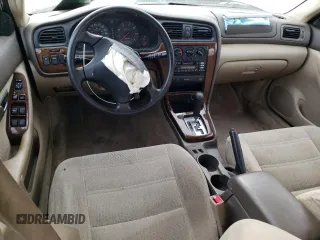 2002 Subaru Legacy Outback with VIN 4S3BH665027661268, listed as a Copart auction lot 43043025 with 215,150 mi miles and Salvage title. Bid and sale history available at DreamBid. Image 8.