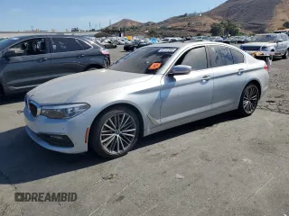 2018 BMW 5 Series 530i with VIN WBAJA5C55JG899997, listed as a Copart auction lot 64137085 with Not provided miles and Clean title. Bid and sale history available at DreamBid. Image 1.