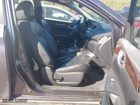 2015 Nissan Sentra S with VIN 3N1AB7AP5FY310374, listed as a IAAI auction lot 41653454 with 142,039 mi miles. Bid and sale history available at carsss.com. Image 5.