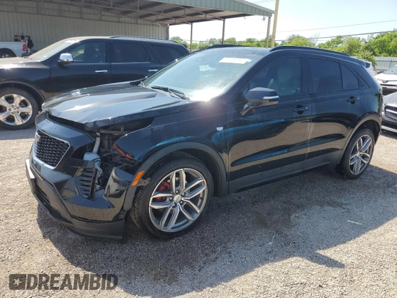 2021 Cadillac XT4 FWD Sport with VIN 1GYFZER44MF015908, listed as a Copart auction lot 52214925 with 94,079 mi miles and Clean Title. Bid and sale history available at carsss.com. Image 1.