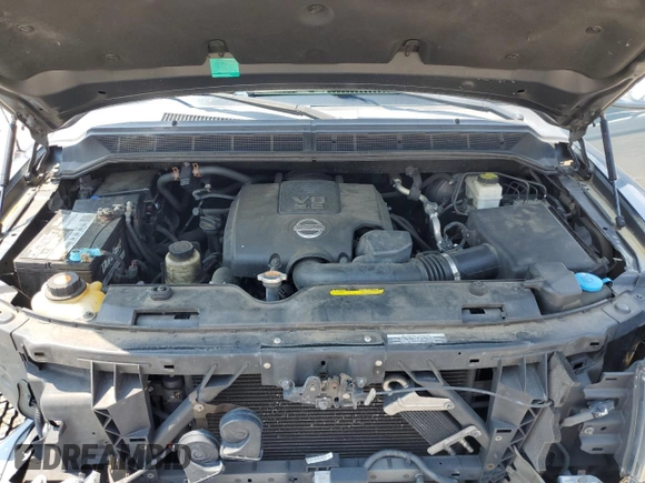 2011 Nissan Titan SL with VIN 1N6AA0EC4BN305296, listed as a Copart auction lot 59001395 with 194,557 mi miles and Salvage title. Bid and sale history available at DreamBid. Image 11.