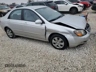 2009 Kia Spectra SX with VIN KNAFE221195656606, listed as a Copart auction lot 84694524 with Not Provided miles and Salvage Title. Bid and sale history available at carsss.com. Image 4.