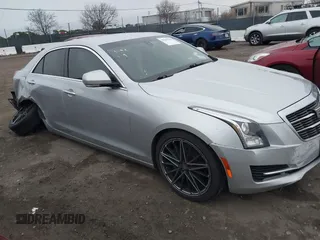 2017 Cadillac ATS Luxury RWD z VIN 1G6AB5RX9H0114962, wystawiony jako IAAI lot #39059344 z przebiegiem 113 387 mil mil oraz . Historia ofert i sprzedaży dostępna na DreamBid. Obrazek 1.