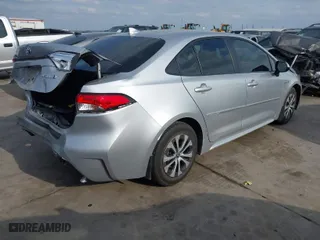 2020 Toyota Corolla Hybrid LE with VIN JTDEBRBE9LJ019691, listed as a IAAI auction lot 41600237 with 79,969 mi miles. Bid and sale history available at carsss.com. Image 4.