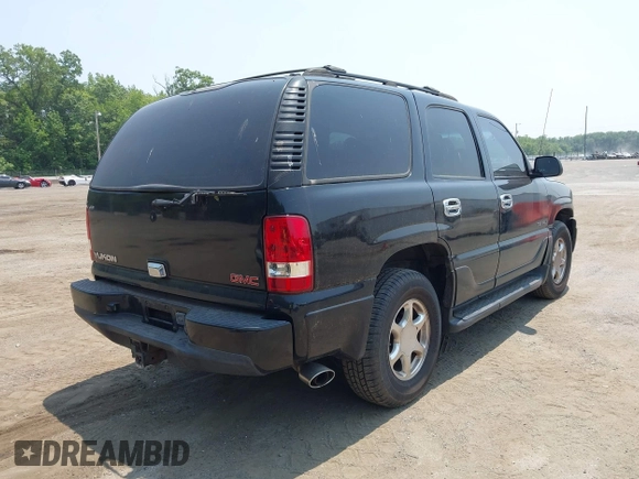 2002 GMC Yukon Denali z VIN 1GKEK63U82J189550, wystawiony jako IAAI lot #42416885 z przebiegiem 209 115 mil mil oraz . Historia ofert i sprzedaży dostępna na DreamBid. Obrazek 4.