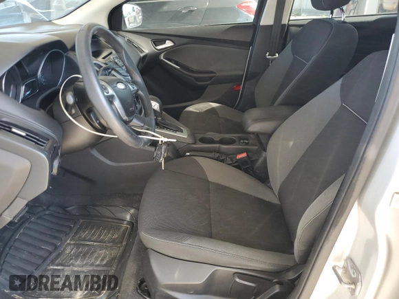 2012 Ford Focus SE with VIN 1FAHP3F29CL161559, listed as a Copart auction lot 61695575 with 127,412 mi miles and Salvage title. Bid and sale history available at DreamBid. Image 7.