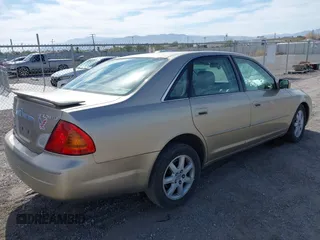 2002 Toyota Avalon XL with VIN 4T1BF28B42U264581, listed as a IAAI auction lot 42034260 with 155,296 mi miles and . Bid and sale history available at DreamBid. Image 4.