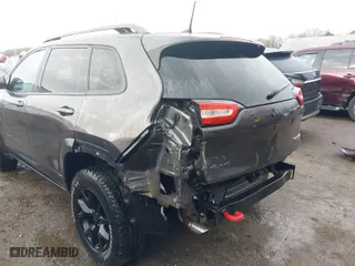 2018 Jeep Cherokee Trailhawk with VIN 1C4PJMBB3JD516090, listed as a IAAI auction lot 41460960 with 97,639 mi miles. Bid and sale history available at carsss.com. Image 6.