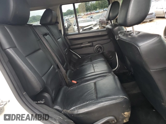 2008 Jeep Commander Sport with VIN 1J8HH48K68C115276, listed as a Copart auction lot 58859035 with 177,233 mi miles and Salvage title. Bid and sale history available at DreamBid. Image 11.