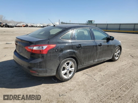 2014 Ford Focus SE with VIN 1FADP3F20EL182320, listed as a Copart auction lot 48985215 with 102,201 mi miles and Salvage Title. Bid and sale history available at carsss.com. Image 3.