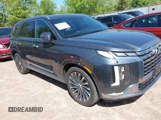 2023 Hyundai Palisade Calligraphy z VIN KM8R7DGE1PU502462, wystawiony jako IAAI lot #42282103 z przebiegiem 69 487 mil mil oraz . Historia ofert i sprzedaży dostępna na DreamBid. Obrazek 1.