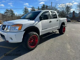 2015 Nissan Titan SL with VIN 1N6BA0EC7FN509763, listed as a Copart auction lot 88064785 with 168,916 mi miles and Clean Title. Bid and sale history available at carsss.com. Image 1.