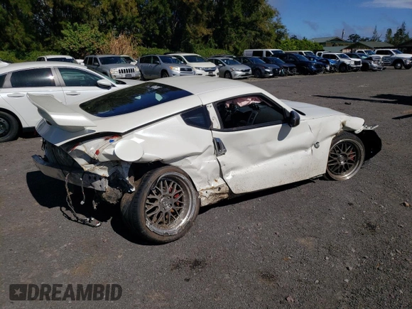 2014 Nissan 370Z Nismo with VIN JN1AZ4EH2EM630833, listed as a Copart auction lot 81773274 with 38,051 mi miles and Salvage Title. Bid and sale history available at DreamBid. Image 3.