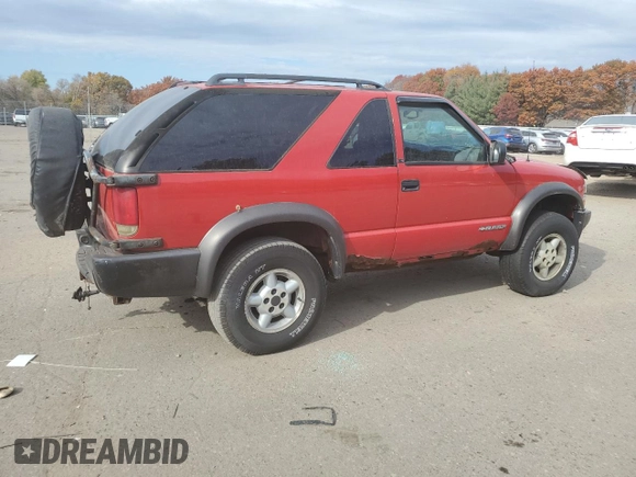 2000 Chevrolet Blazer LS z VIN 1GNCT18W8YK155812, wystawiony jako Copart lot #77315424 z przebiegiem 151 418 mil mil oraz Czysty tytuł • Clean title. Historia ofert i sprzedaży dostępna na DreamBid. Obrazek 3.