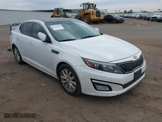 2015 Kia Optima EX with VIN 5XXGN4A73FG385340, listed as a IAAI auction lot 42035685 with 121,467 mi miles. Bid and sale history available at carsss.com. Image 1.