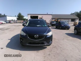 2014 Mazda CX-5 Touring z VIN JM3KE2CYXE0429149, wystawiony jako IAAI lot #42471772 z przebiegiem 222 440 mil mil oraz . Historia ofert i sprzedaży dostępna na DreamBid. Obrazek 12.